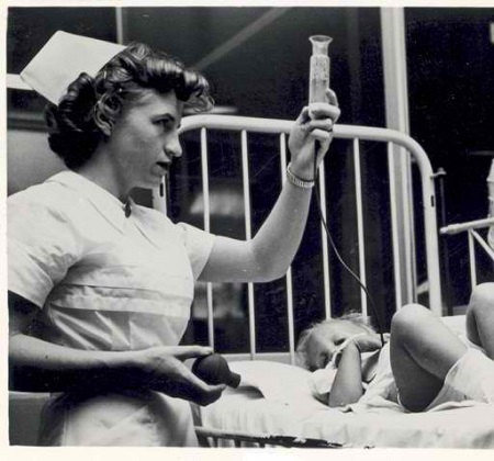 Nurse with patient, St. Louis Children's Hospital, 1956.